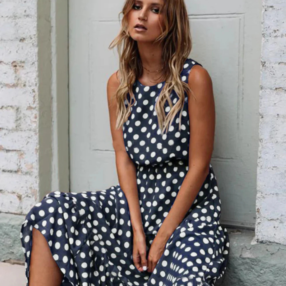 WW | Schwarzes Polka Dot Midikleid Für Einen Retro Chic Look