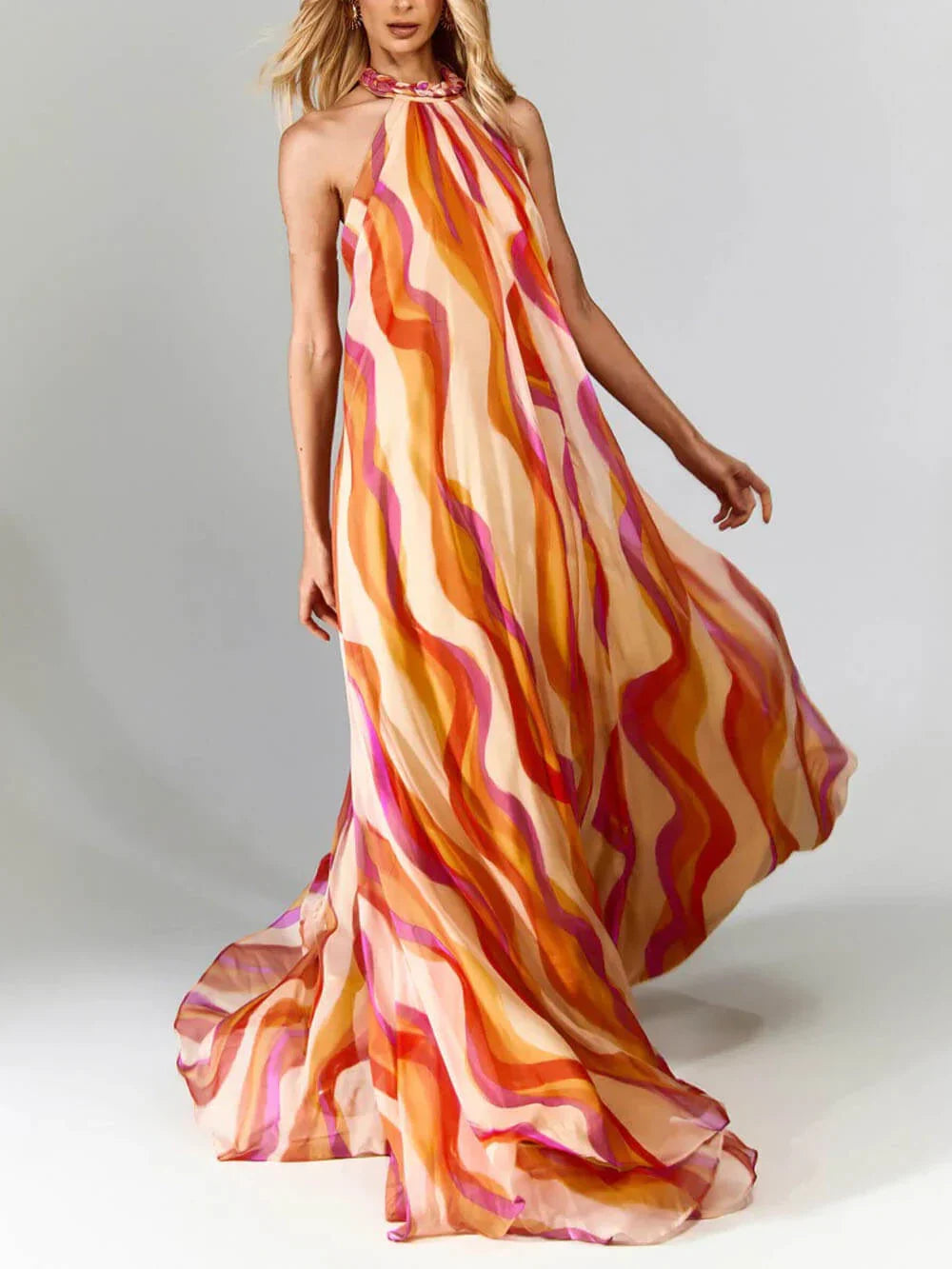 Elegant maxi dress with braided halterneck and wave pattern