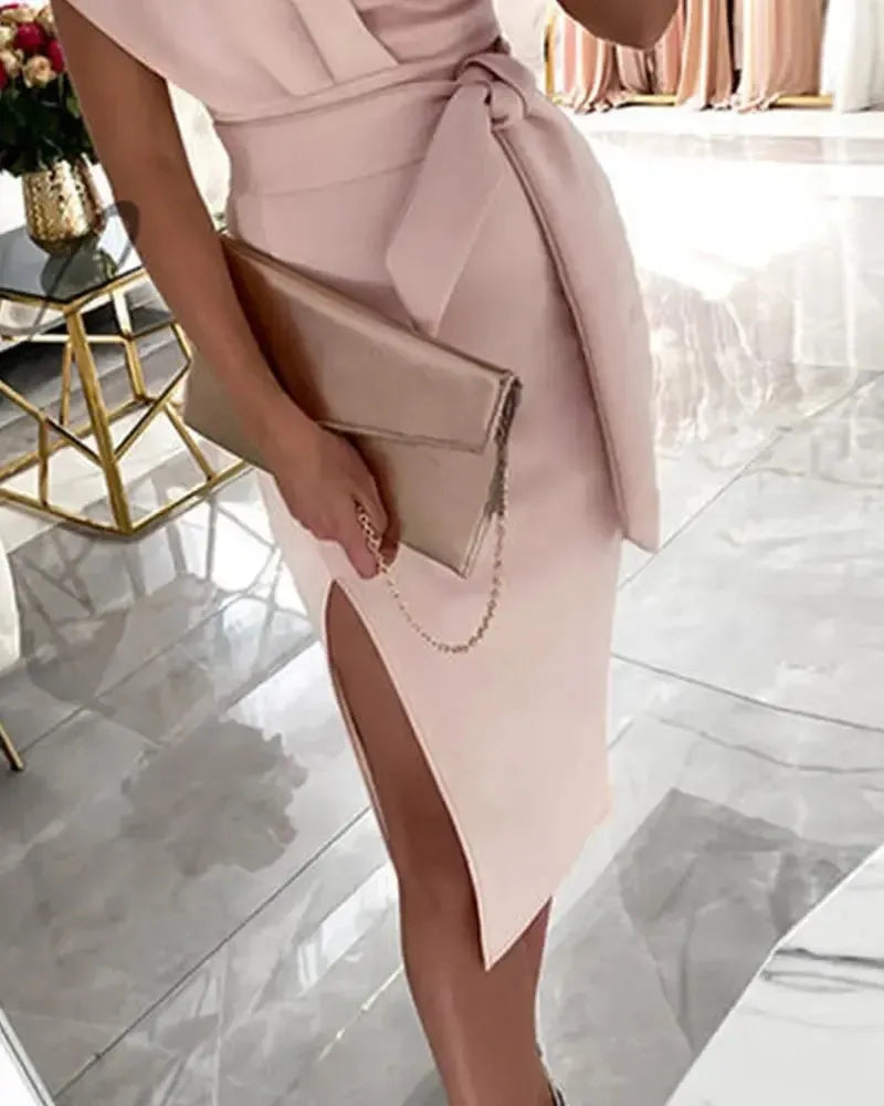 Asymmetric evening gown with belt and side slit for an elegant look