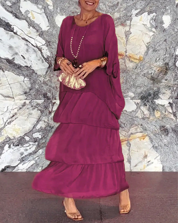 Langes Kleid mit künstlerischem Design und Stil