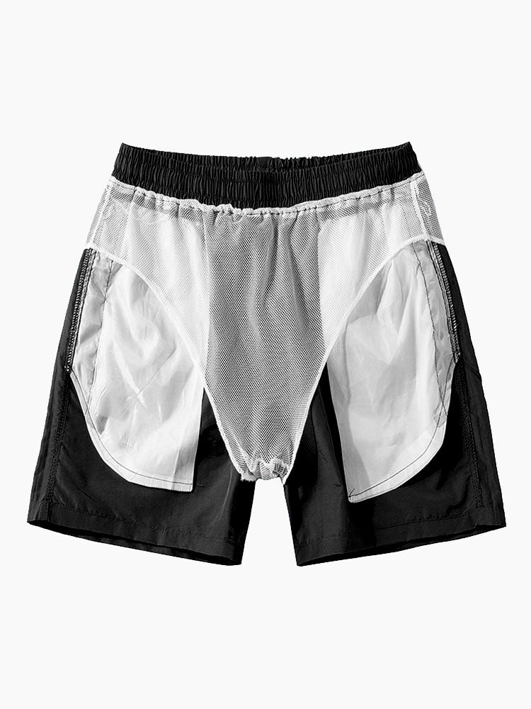 Hemd mit Palmenmuster und Badehose mit Knopfleiste