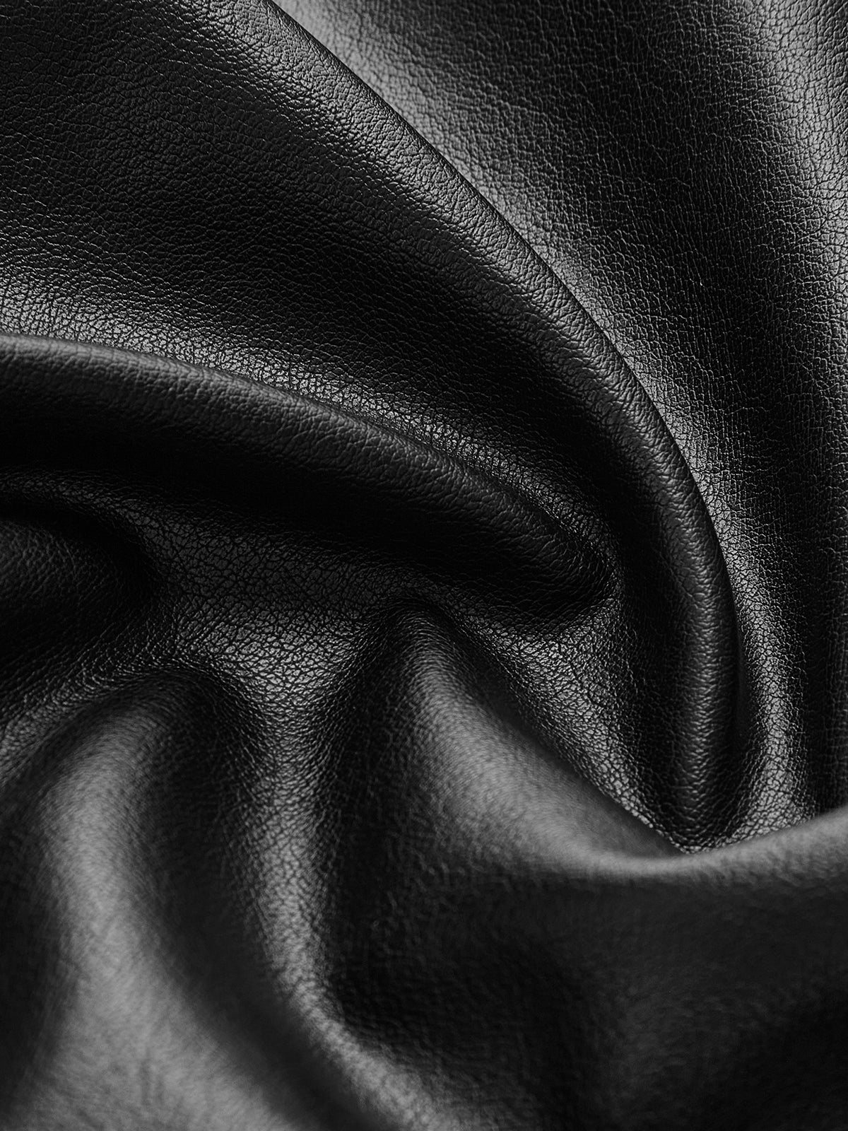 WW | Gürtelte Kunstlederjacke