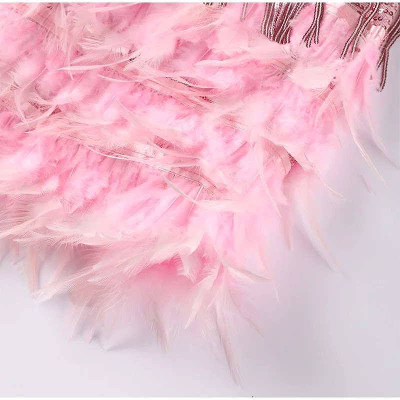 Sorvaya™ | Glamouröses Federkleid