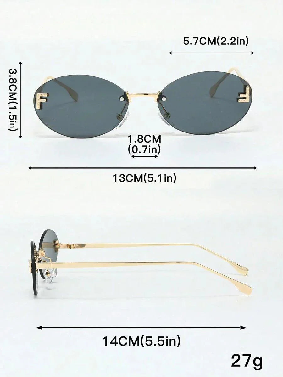 WW | Ovale Sonnenbrille Mit Goldenen Akzenten Und Subtilen Steinen