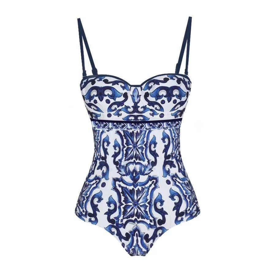 Women's swimsuit set with elegant wrap-skirt look and charming motif WW