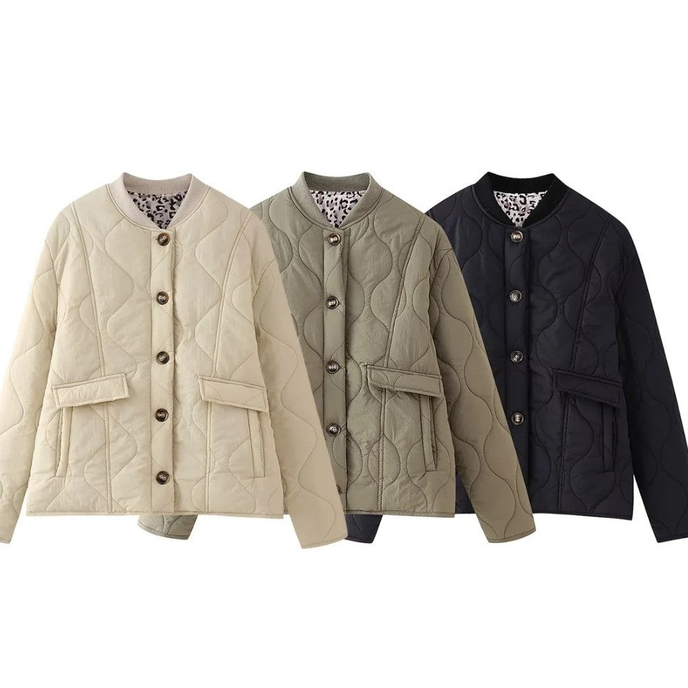 Women's quilted jacket in an elegant design with practical button fastening and side pockets WW