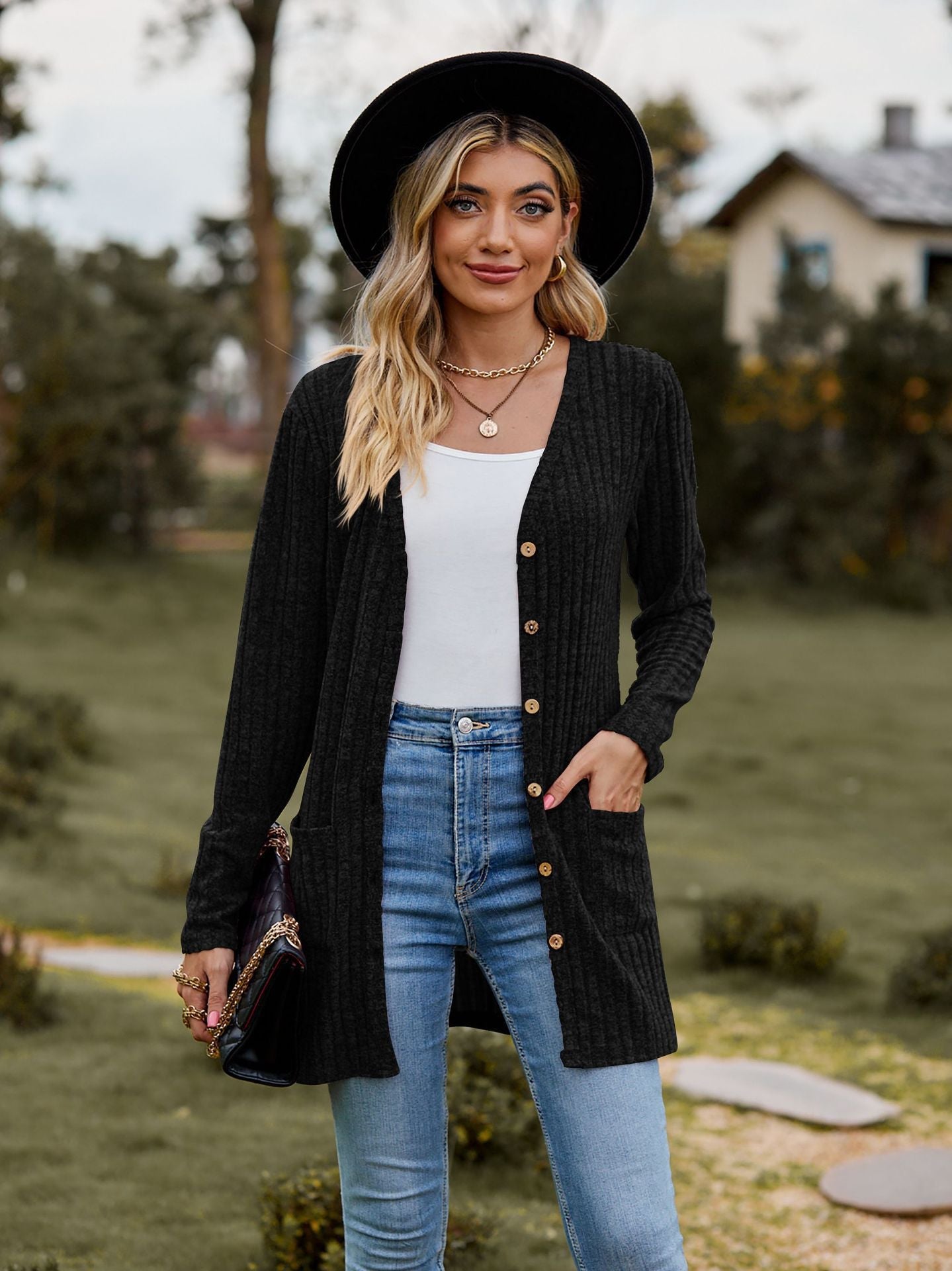 Damen Strickjacke mit elegantem Rippenmuster und praktischen Taschen WW