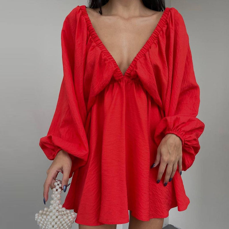 WW | Gerafftes Minikleid mit Schmetterlingsärmeln