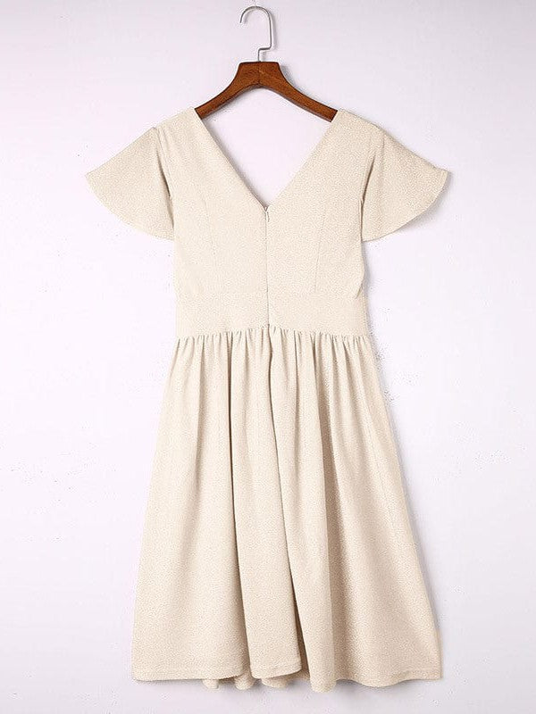 Elegant V-neck dress with pleats and ruffle details for a sophisticated look