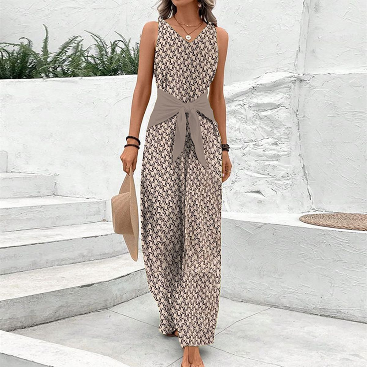 WW | Sleeveless jumpsuit with round neckline.