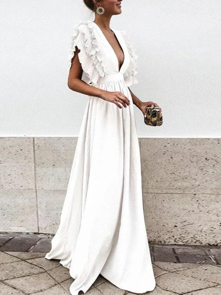 WW | Elegantes Kleid mit V-Ausschnitt und Rüschensäumen