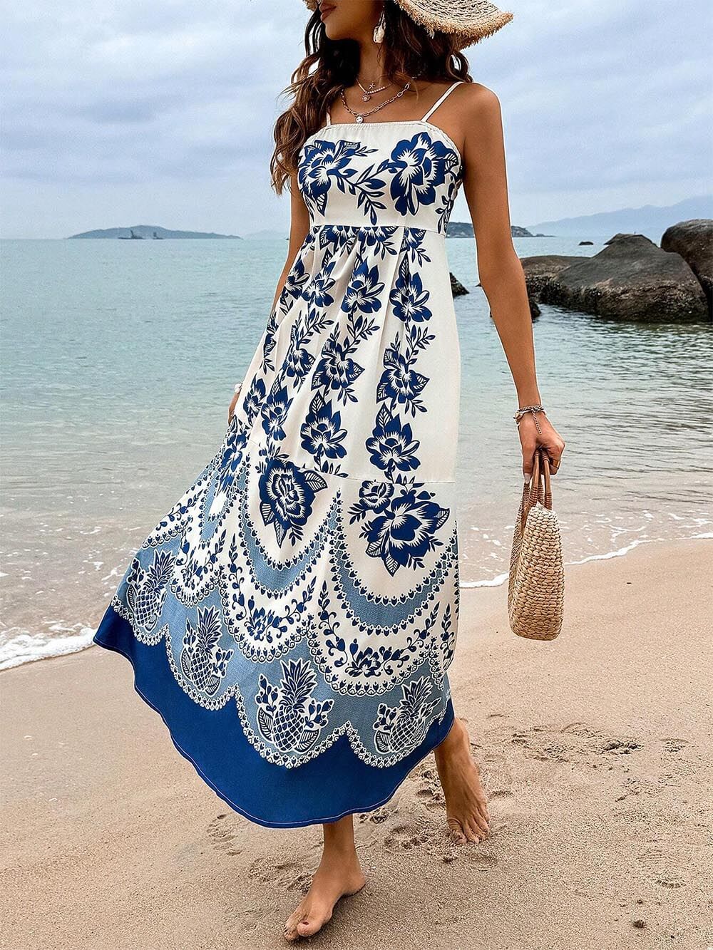 Ethically printed midi dress with a floral pattern, gathered back, and a loose fit