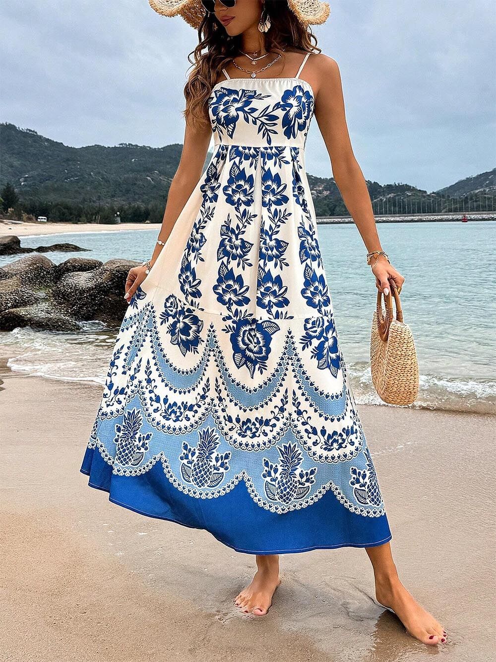 Ethically printed midi dress with a floral pattern, gathered back, and a loose fit