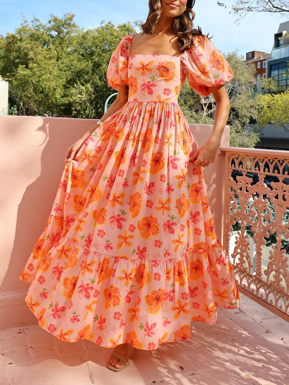 Maxi dress with puff sleeves, floral print, ruched back, and pockets
