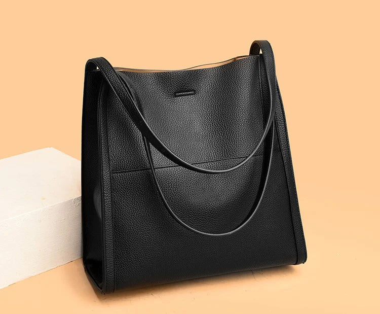 – Plain shoulder bag made of genuine leather