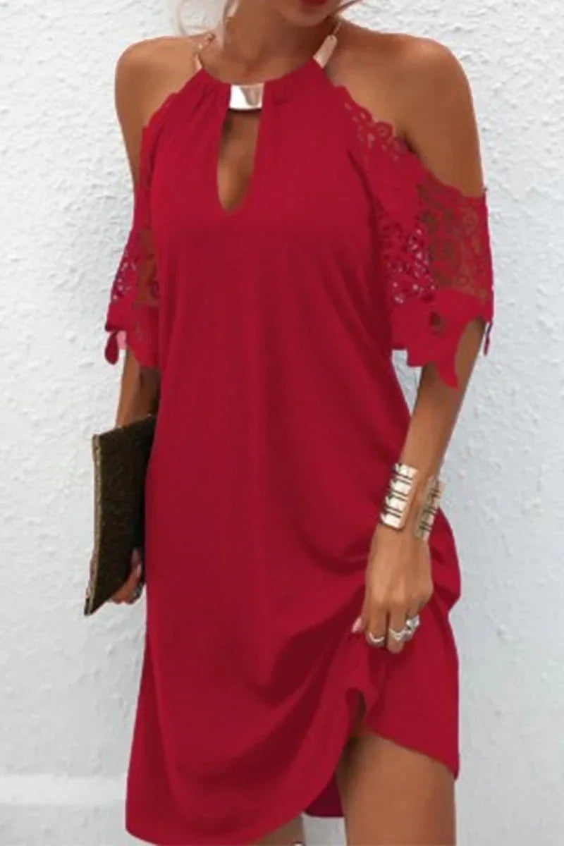 Naila - Elegant plain lace dress with metallic accessories and embellishments, including a waist belt