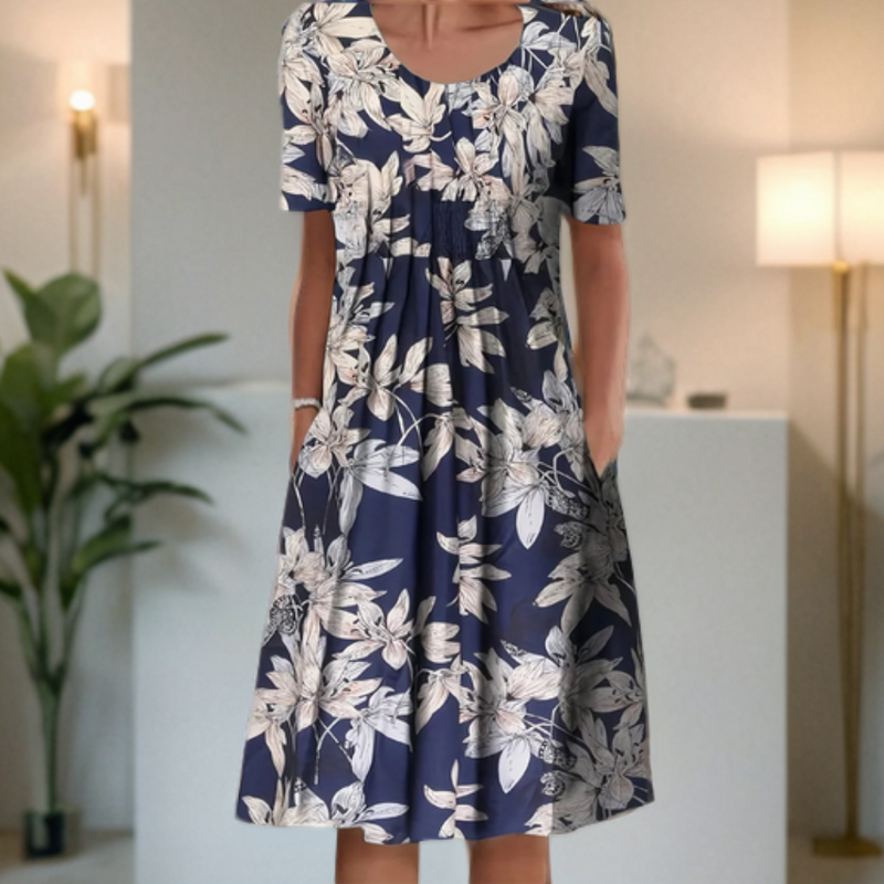 Wide dress with a round neckline, three-quarter sleeves, and a printed design