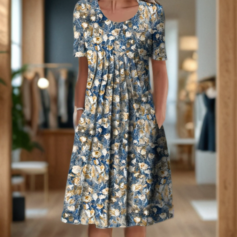 Wide dress with a round neckline, three-quarter sleeves, and a printed design