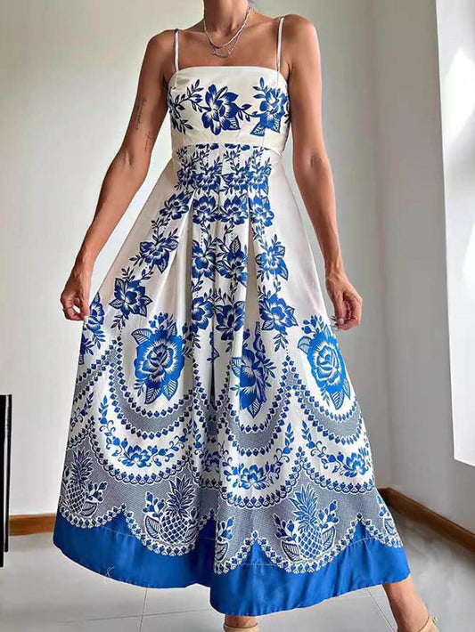 Ethically printed midi dress with a floral pattern, gathered back, and a loose fit