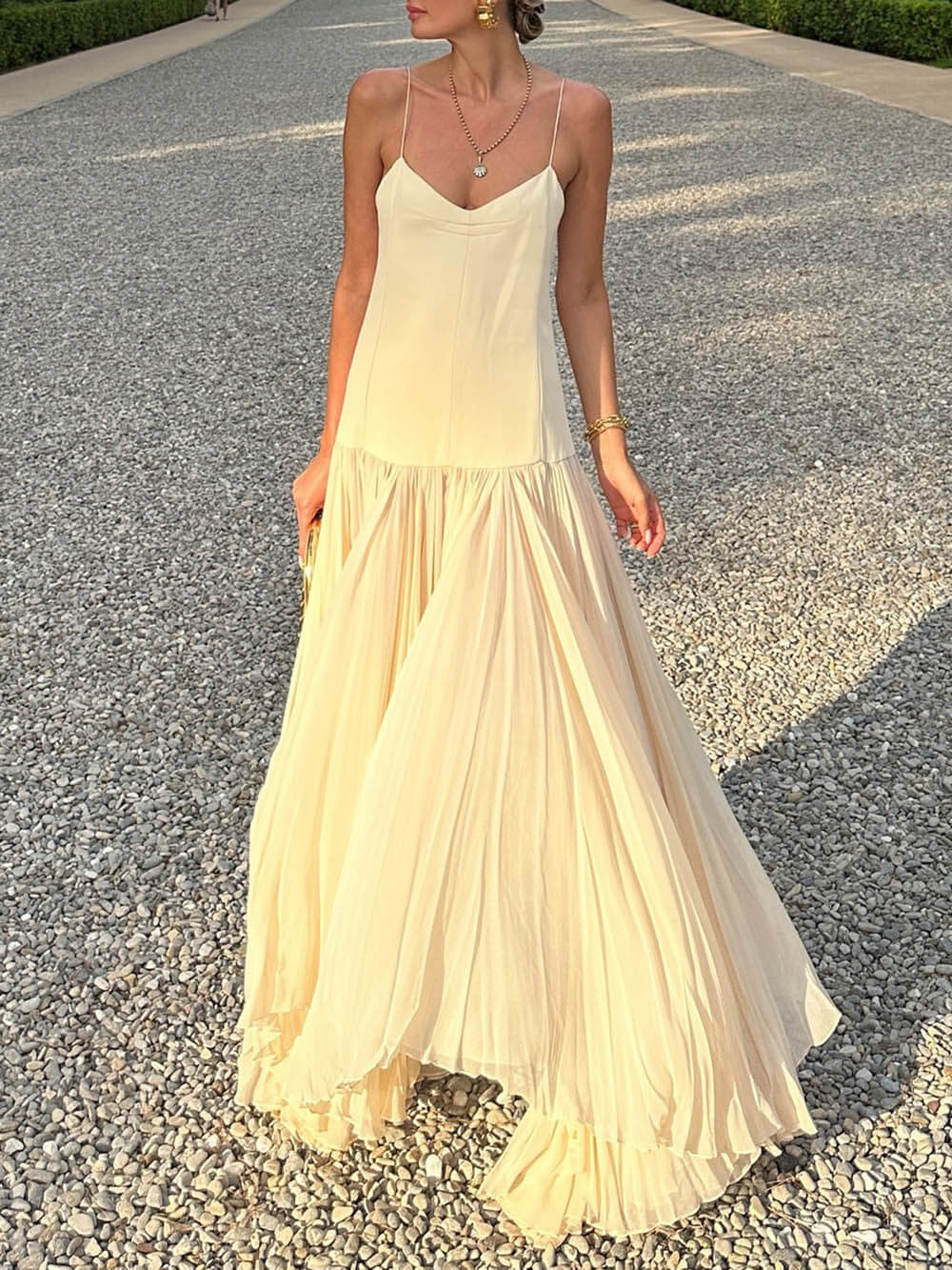 Dress with straps, drop waist, and irregular hem