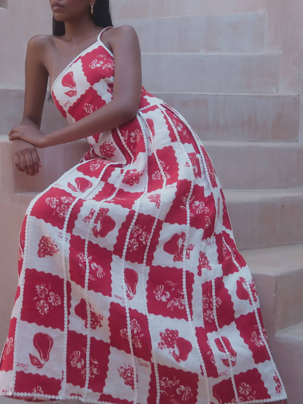 Unique, printed maxi dress with floral trim and one-sided flared cut