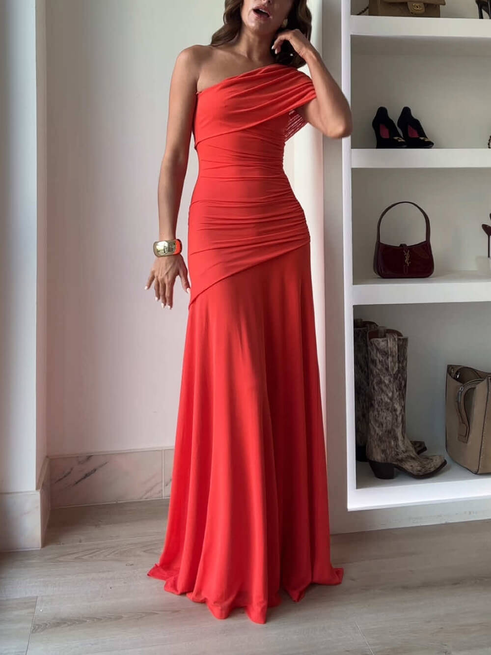 Elegant long dress with an off-the-shoulder design and ruching, ideal for events and celebrations