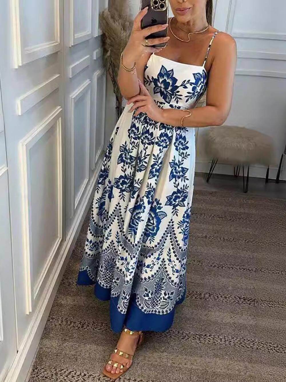 Ethically printed midi dress with a floral pattern, gathered back, and a loose fit
