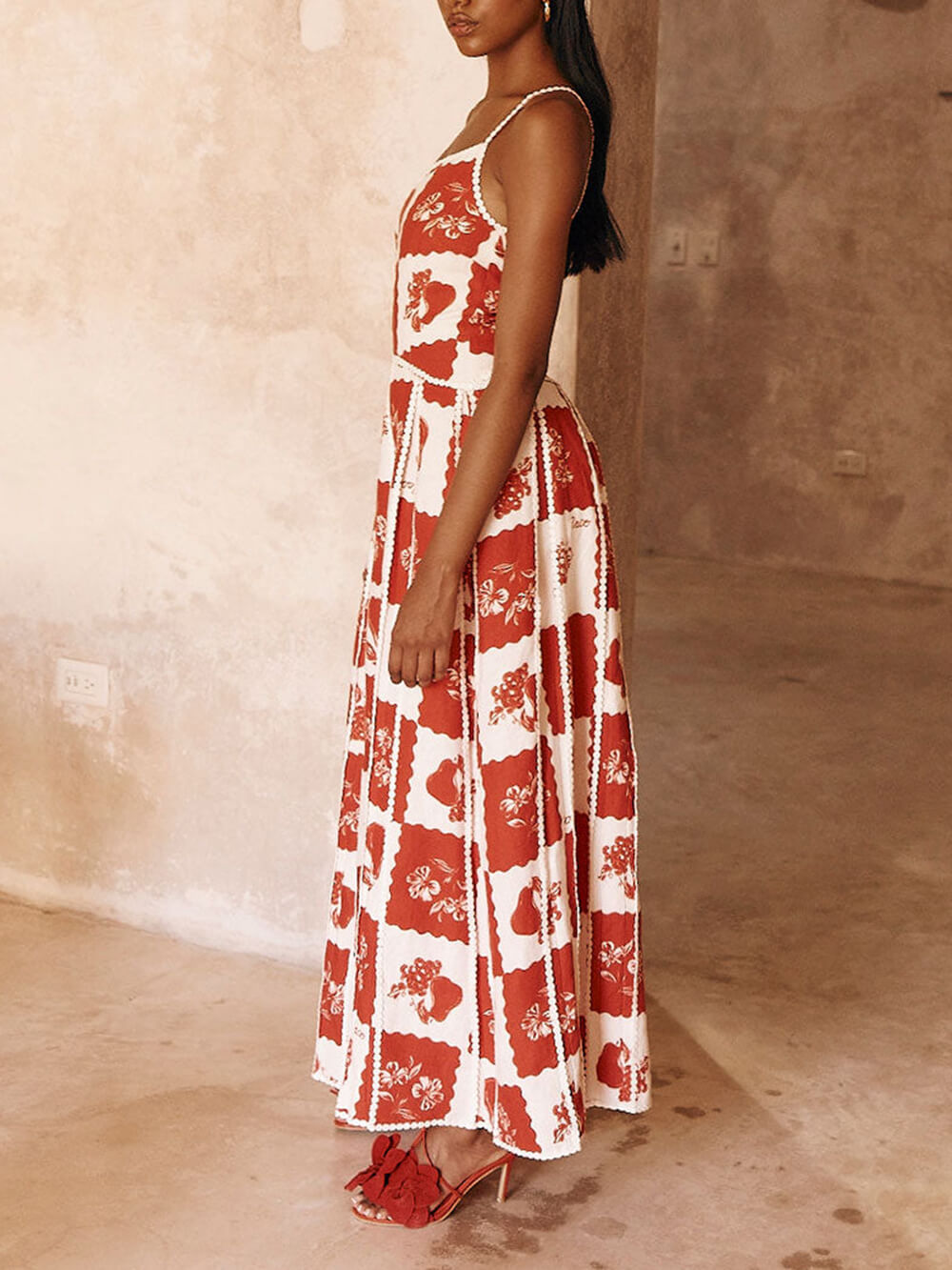 Unique, printed maxi dress with floral trim and one-sided flared cut