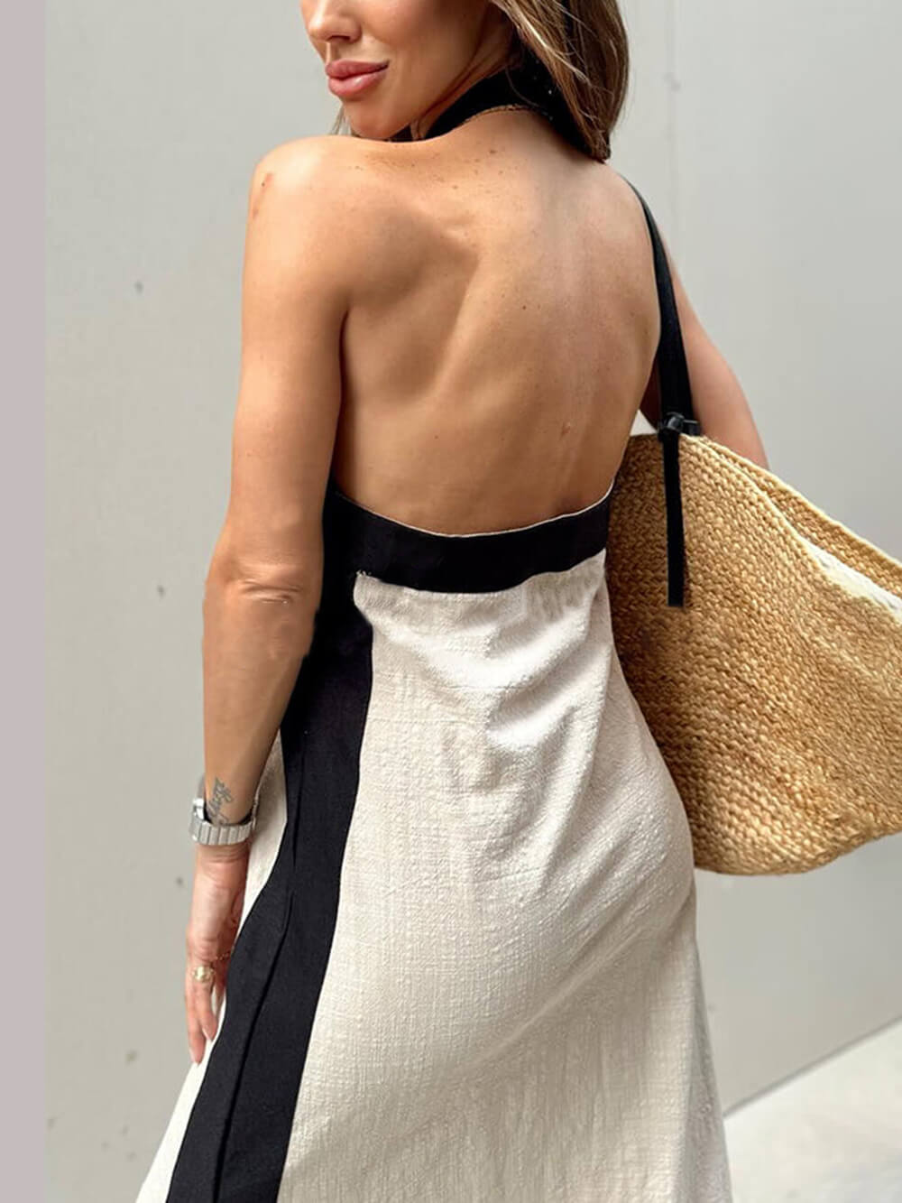Halterneck maxi dress with slit and color block design