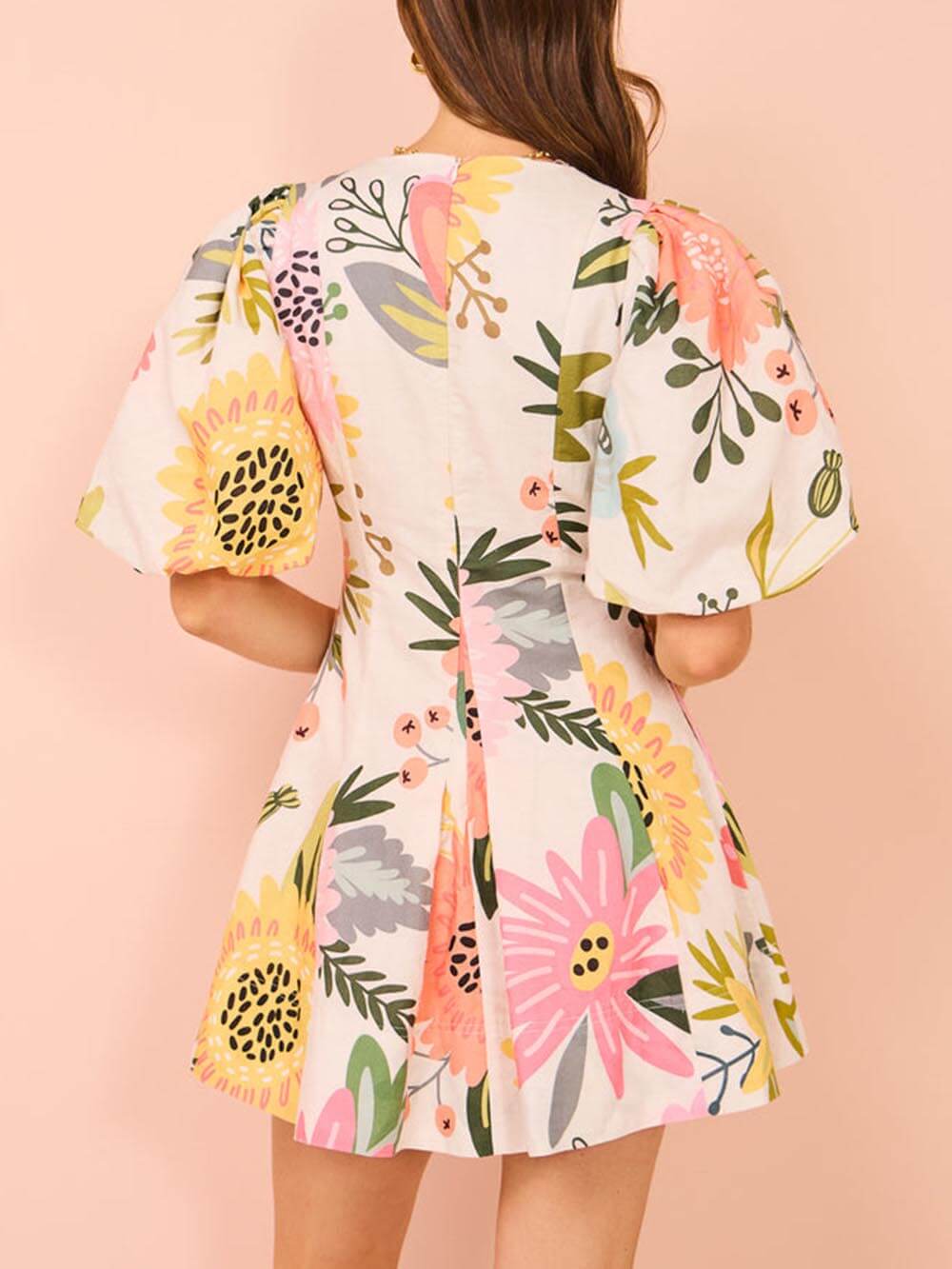 Mini dress with puff sleeves, floral print, and pockets