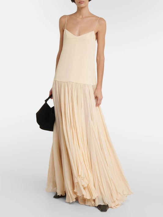 Dress with straps, drop waist, and irregular hem