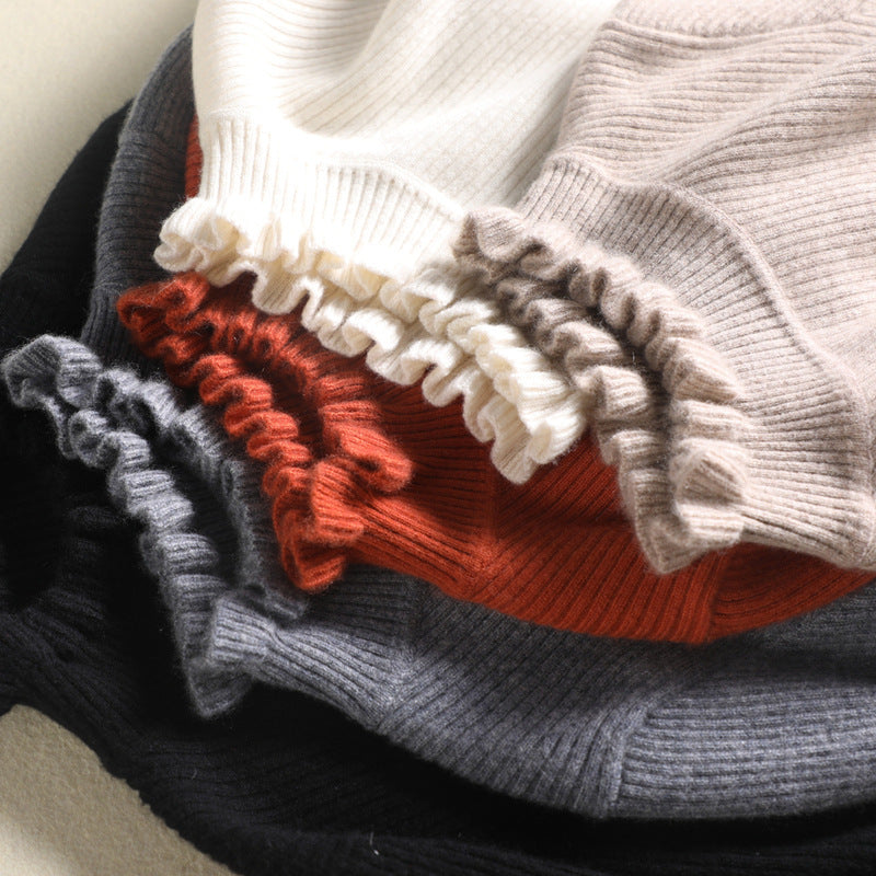 WW | Cozy roll-neck knit sweater with delicate ruffle details