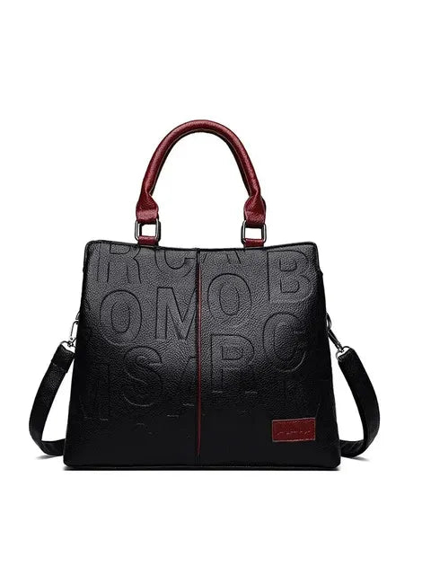 WW – Damenhandtasche aus weichem Leder mit geprägtem Buchstabendesign