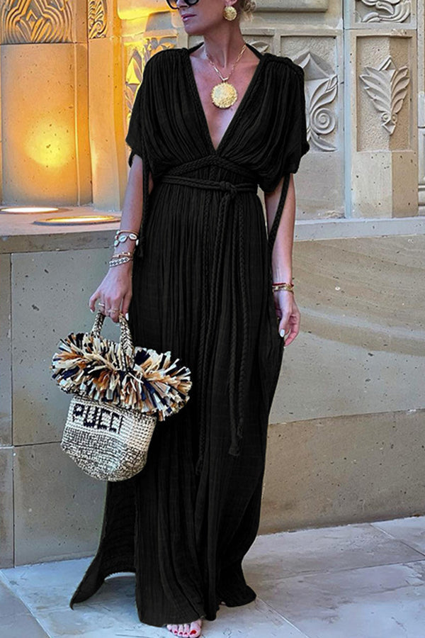 Long, draped Greek-style dress with decorative braided details and kimono sleeves