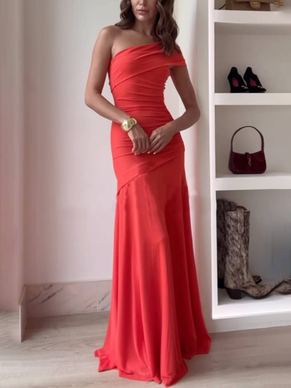 Elegant long dress with an off-the-shoulder design and ruching, ideal for events and celebrations