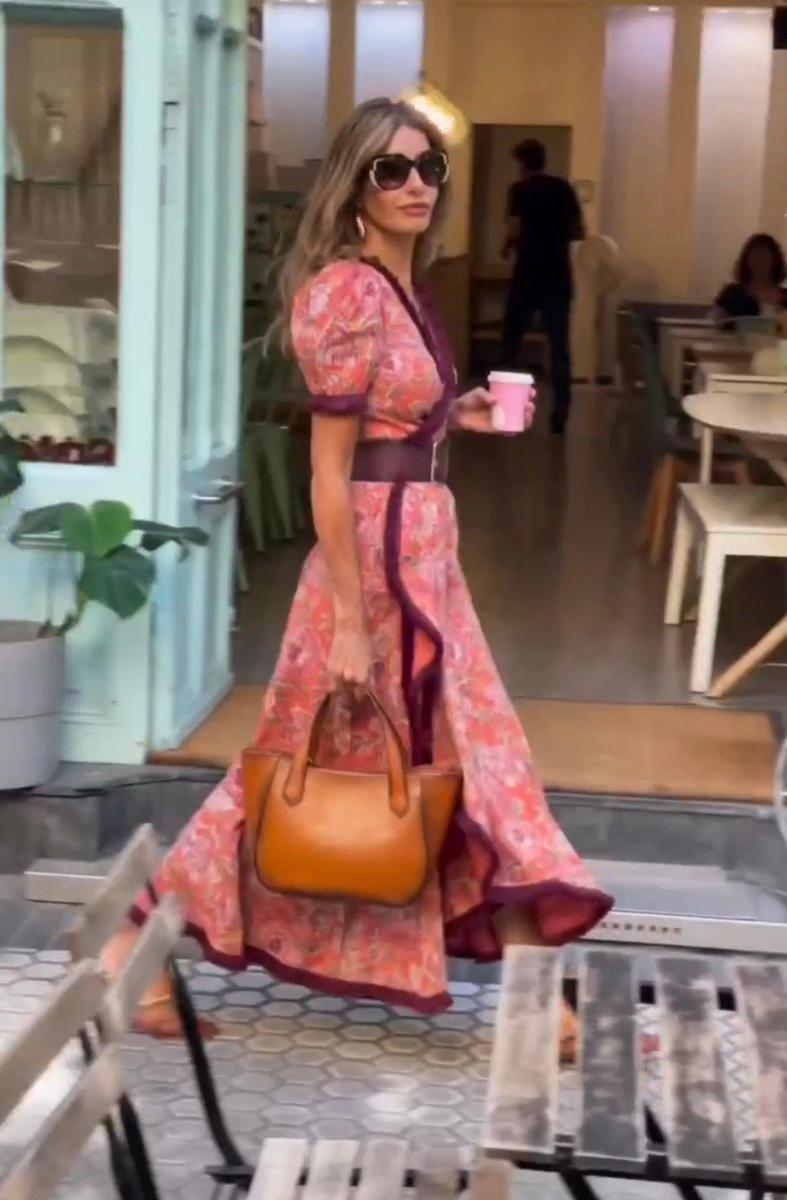 Elegant long dress with short puff sleeves and asymmetrical skirt