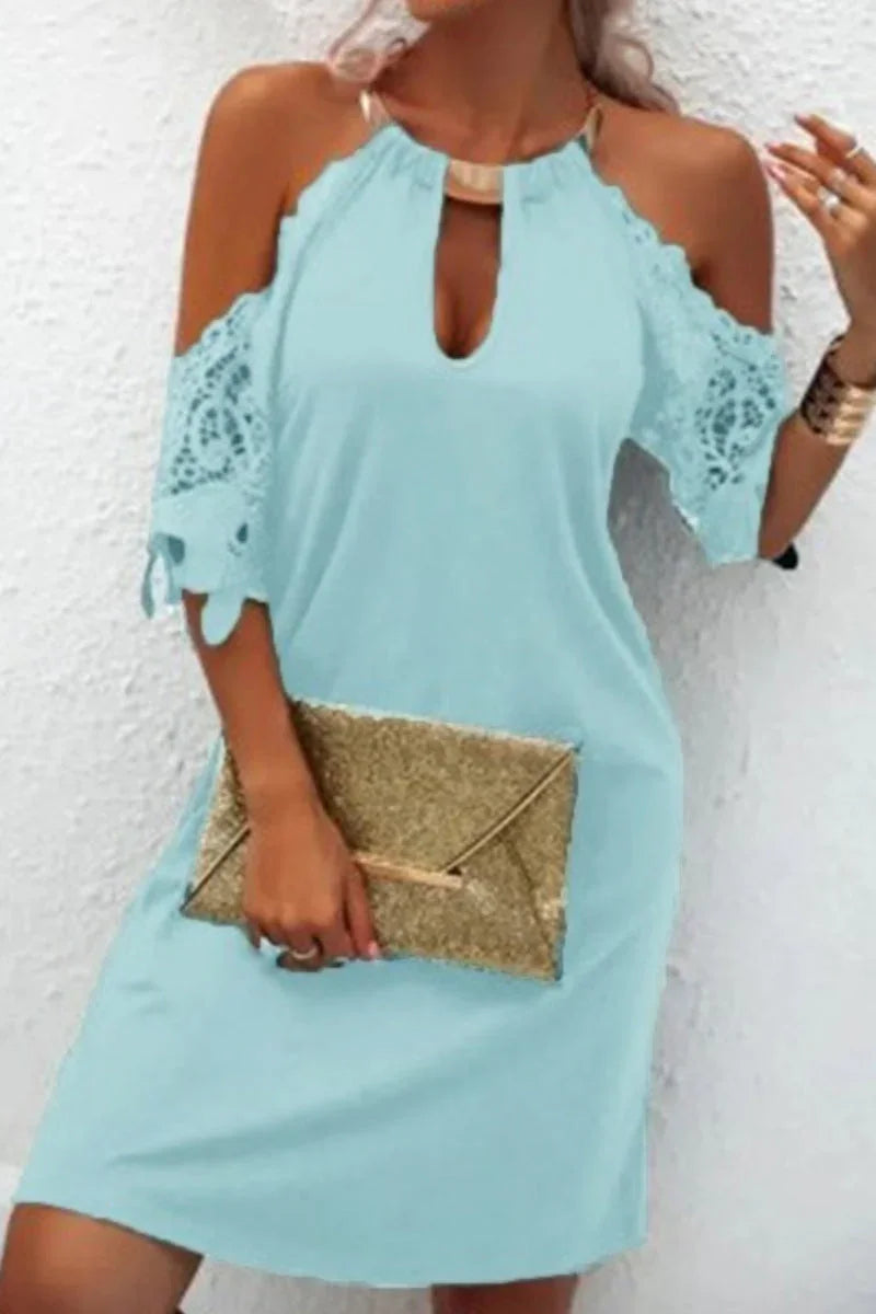 Naila - Elegant plain lace dress with metallic accessories and embellishments, including a waist belt