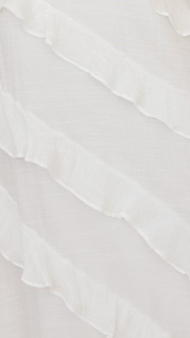 Modern, lightweight long dress with fine drawstring at the neckline and diagonal ruffles