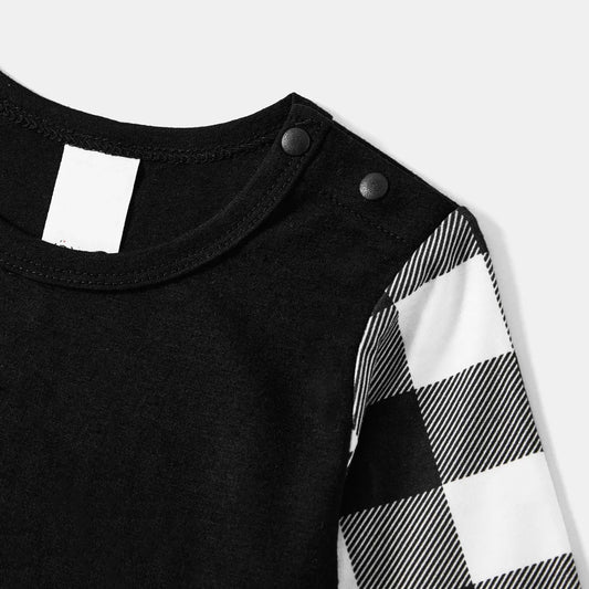 WW | Black-and-white checkered Christmas pajama set with "We Wish You A Merry Christmas" black-and-white text print