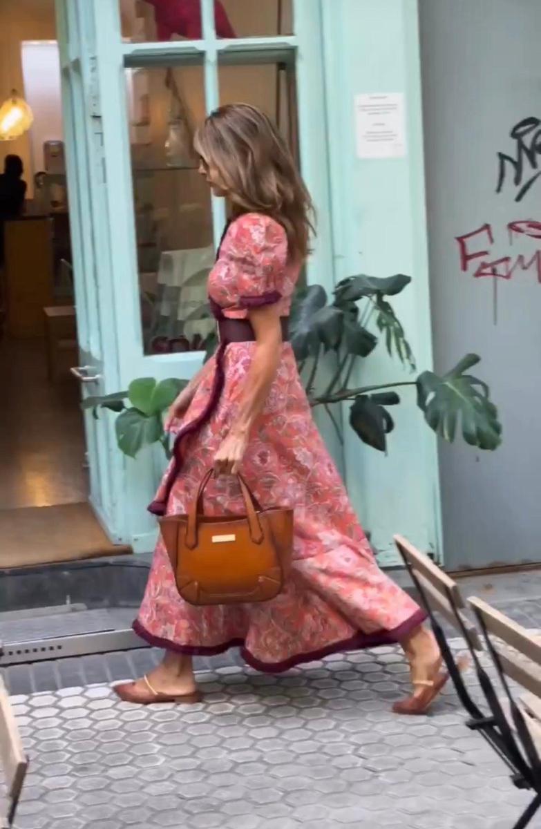 Elegant long dress with short puff sleeves and asymmetrical skirt