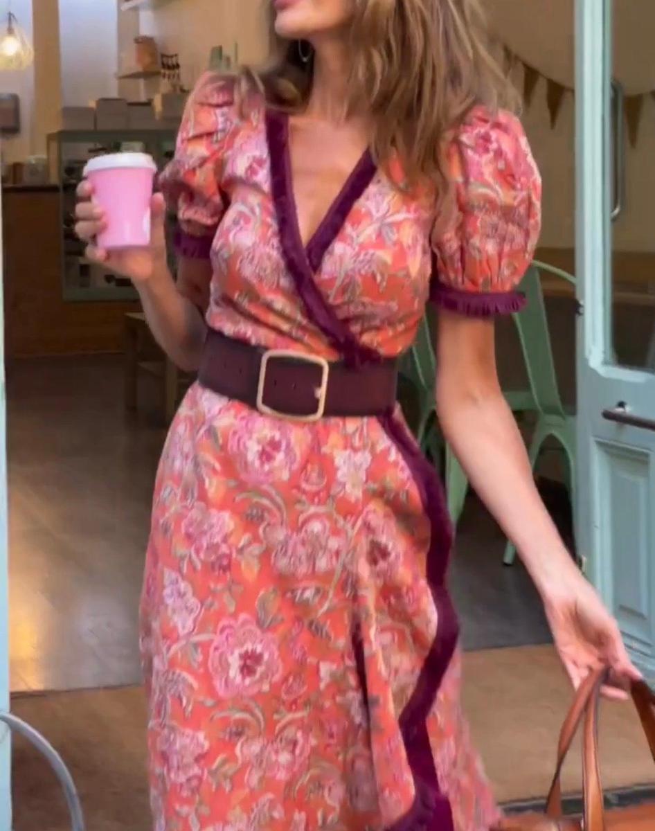 Elegant long dress with short puff sleeves and asymmetrical skirt