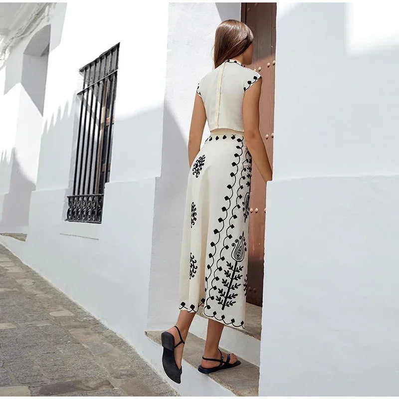 Set of a short top and a wrap skirt with an embroidered ethnic print