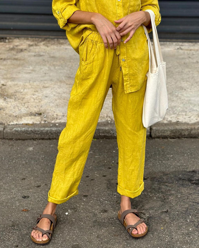 V-neck shirt and cotton trousers