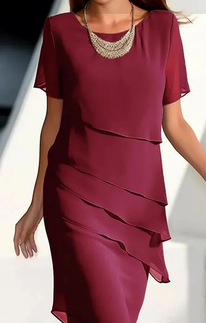 Karen - Elegant, soft short-sleeved dress with a round neckline and simple patch