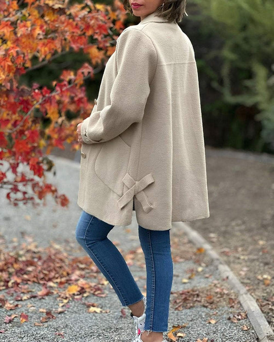 WW | Chic, elegant jacket with a stylish side knot detail.