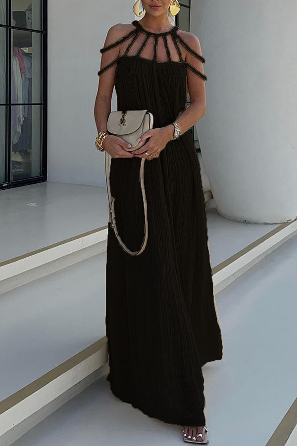Long pleated dress with cord detailing and an artistic neckline