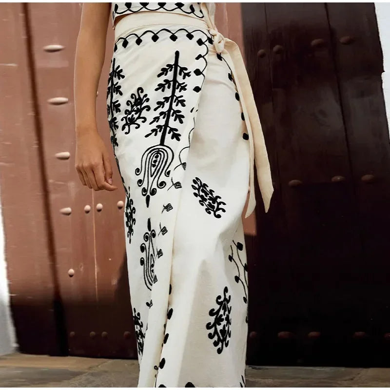 Set of a short top and a wrap skirt with an embroidered ethnic print