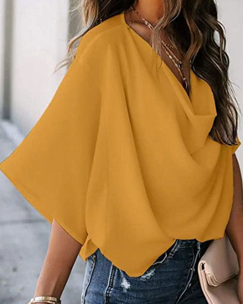 WW | A Solid-Colored Blouse with Batwing Sleeves