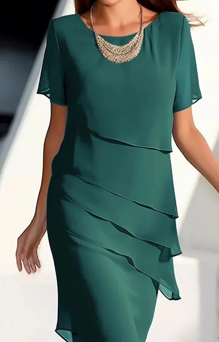 Karen - Elegant, soft short-sleeved dress with a round neckline and simple patch