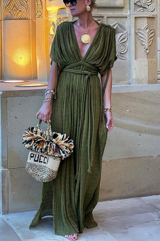 Long, draped Greek-style dress with decorative braided details and kimono sleeves